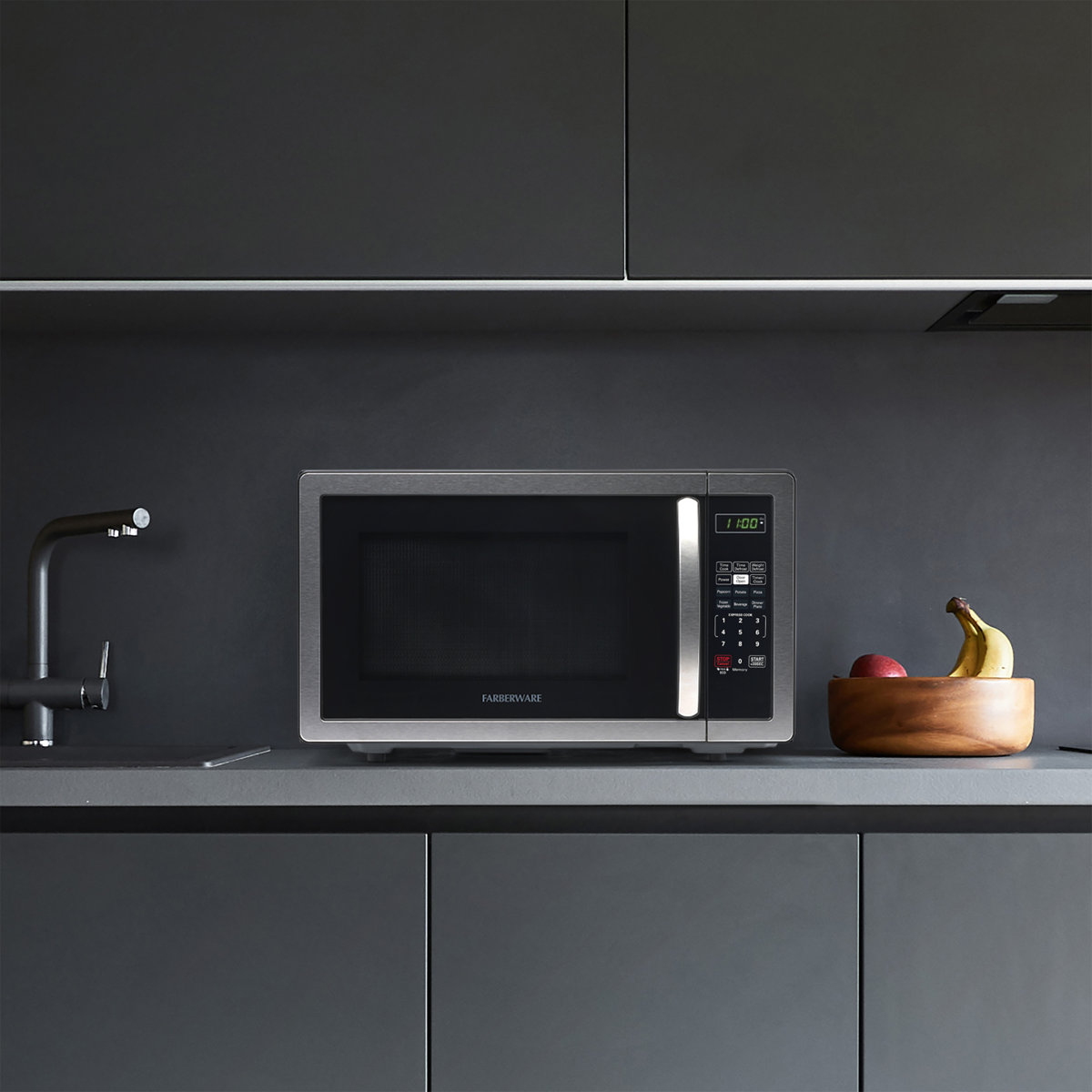 Farberware Classic Countertop Microwave Oven, 1.1 Cubic Feet cu. ft., 1000 watts, with Child Lock FMO11AHTBKB